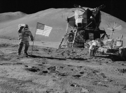 apollo 15 astronaut jim irwin salutes the flag