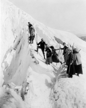 early 1900 Group of men and women climbing Paradise Glacier wash