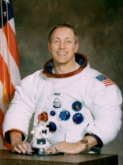 jack swigert poses with a lm model