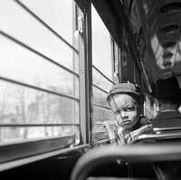 Little boy riding on a streetcar  Washinton DC 1939