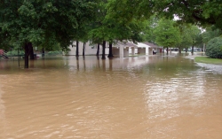 major flooding after heavy rains breeched nearby protective leve