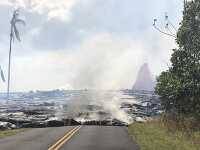 pahoehoe lava advancing onto road