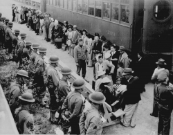 Persons of Japanese ancestry arrive at the Santa Anita Assembly 