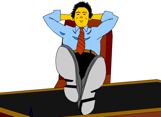 man sitting at his desk with feet up