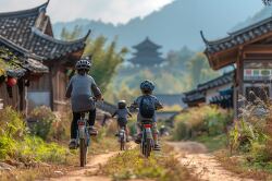 Children riding bikes Asian village