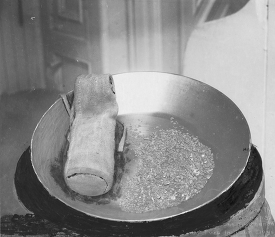 Gold in pan in Alaska 1916 historic photo