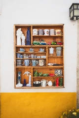 items for sale white washed building obidos portugal