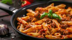 penne pasta in meat tomato sauce