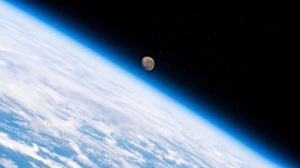 the waning gibbous moon above the earths horizon 11