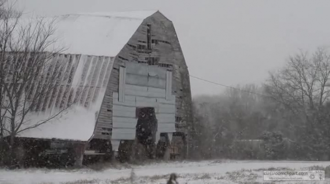 old barn surrounded by snow video