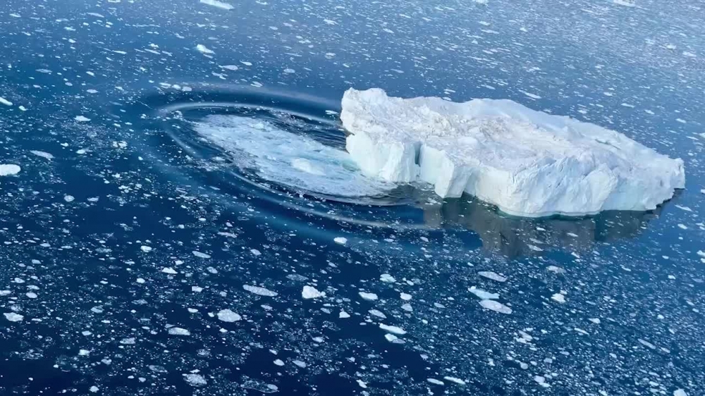 aerial view of floating ice off the coast of greenland