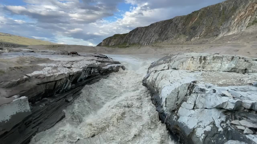 fast water rushing from greenlands glaciers melting