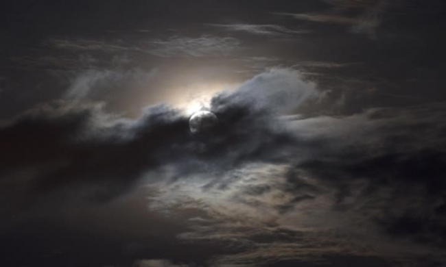 night sky with dark clouds full moon