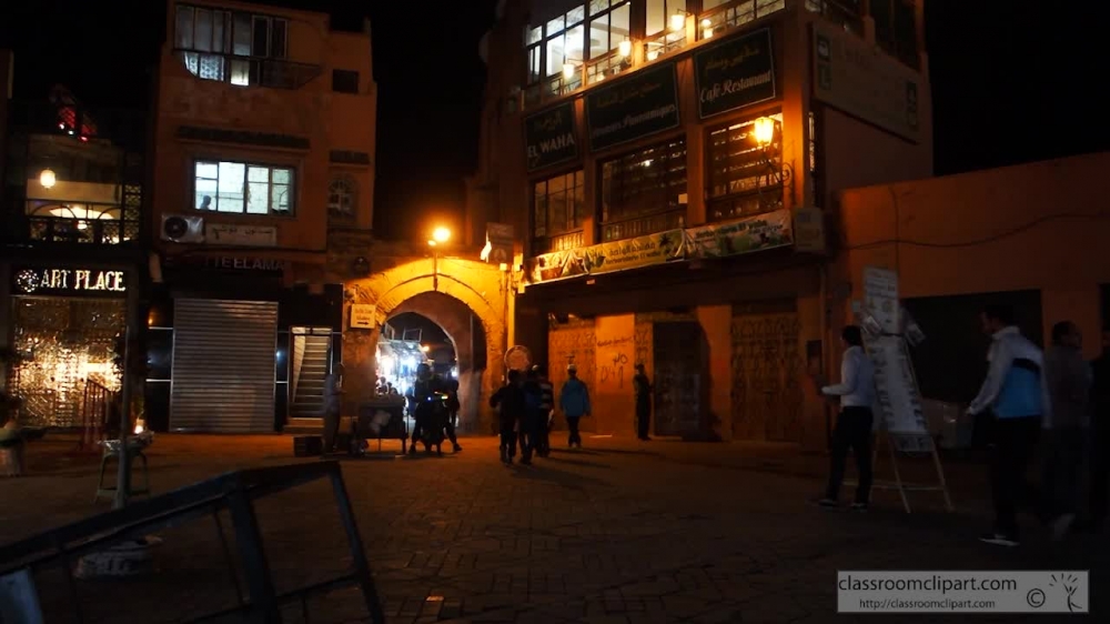 people walking at night near jemaa el fnaa marrakesh