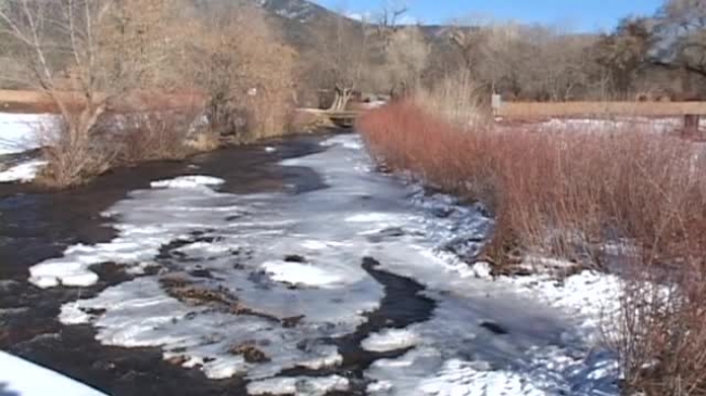 rio grande river with floating ice and snow