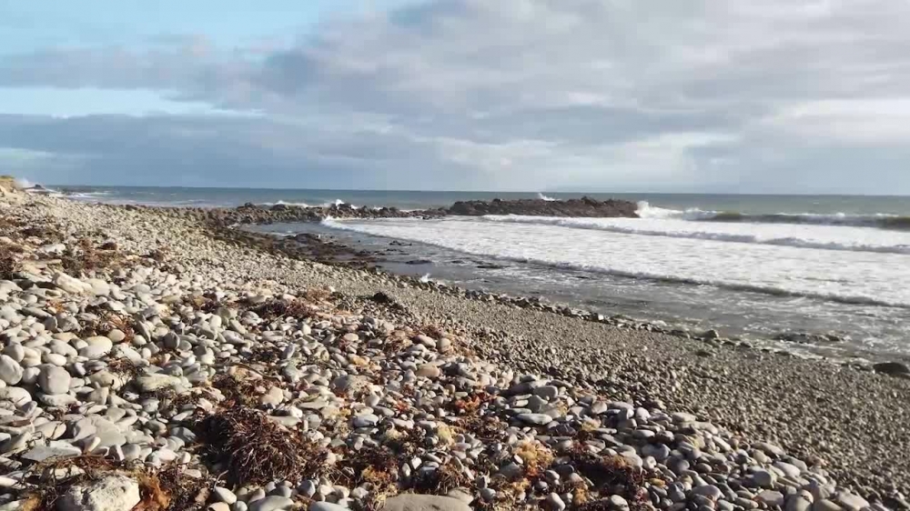 slow motion of waves along the shore of southern california
