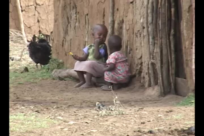 two children in a masai village