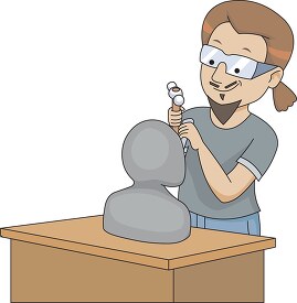 artist working on clay sculpture clipart image