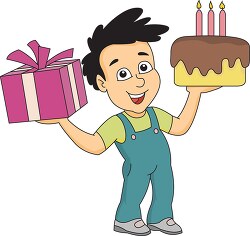 birthday boy holding gift and cake