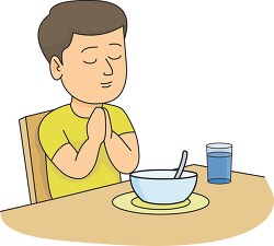 boy praying at dinner table clipart