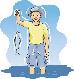 boy standing in water holding fish still on line