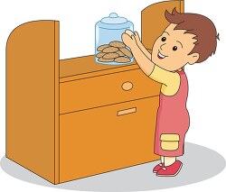 boy taking cookies from cookie jar