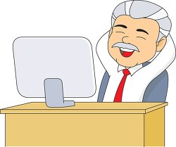 businessman sitting at desk in his office
