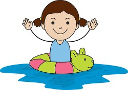 child in swimming pool in animal inner tube