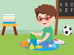 cute boy playing with blocks in kindergarten clipart