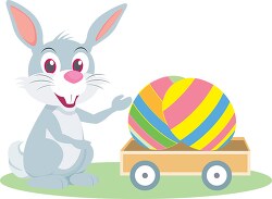easter rabbit with egg filled cart clipart