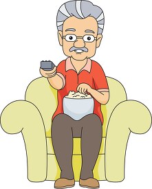 elderly man watching tv eating snacks