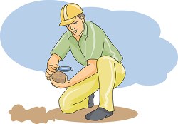geologist with magnifying glass