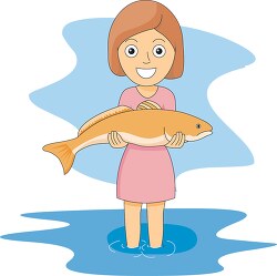 girl in water holding fish
