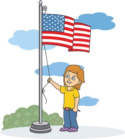girl raising usa flag on flagpole