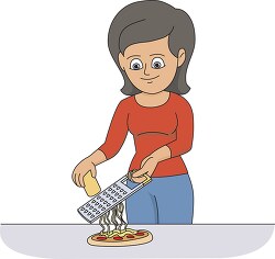 lady grating cheese on pizza