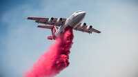 Aerial retardant and water operations fighting forest fire