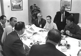 Apollo 7 astronauts breakfast with NASA officials