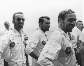 Apollo 7 astronauts greet well-wishers aboard the USS Essex