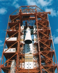 Apollo spacecraft 012 is hoisted to the top of the gantry at lau