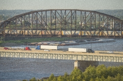autos train and barges along the mississipp river