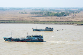Boat traffic on the Yangon river Myanmar 