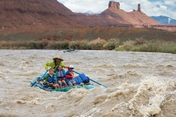 Boaters rafting on the Colorado River outside of Moab Utah