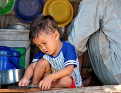 Child in Houseboat Floating Village of Chong Khneas