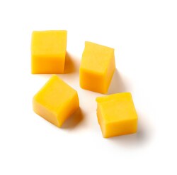 chunks of cheddar cheese on white background