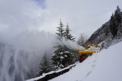 clearing roads from snow in glacier national park