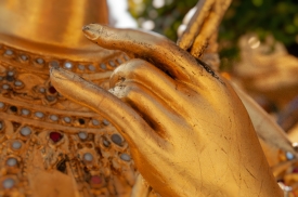 Close Up of the hands Golden statue