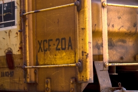 closeup of rusted freight train cargo cars