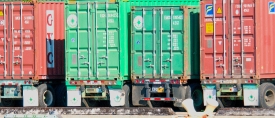 container trucks lined up at harbor