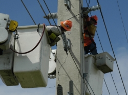 electric technicians restore power hurricane 33