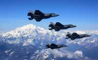Four F-35A Lightning II fighter aircrafts